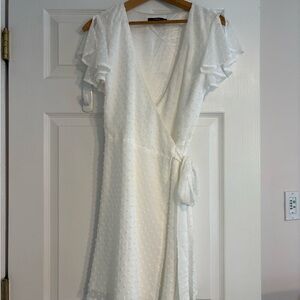 White wrap dress, above knee length. Graduation/bachelorette/confirmation